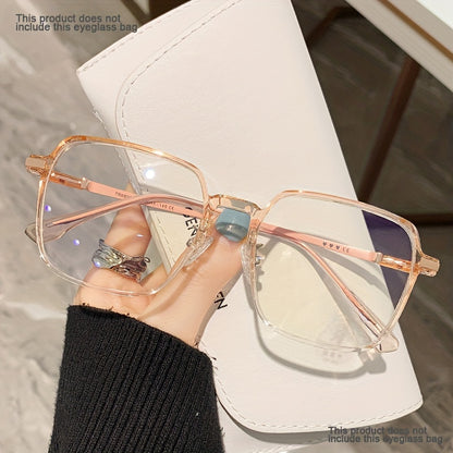 A Pair of Oversized, Slimming Flat Glasses with a Metal Frame, Square Lenses, Transparent Lenses, And a Stylish, Versatile Design.